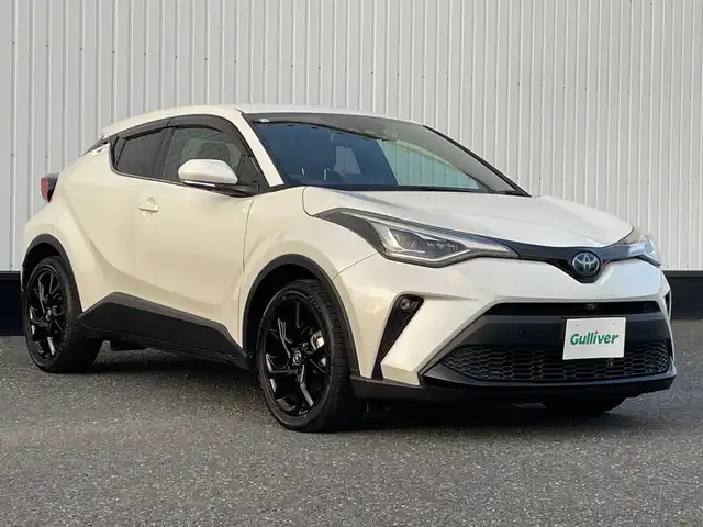 トヨタ Ｃ－ＨＲ G モード ネロ セーフティプラス 千葉県 2020(令2)年 1.9万km ホワイトパールクリスタルシャイン 純正8インチナビ/(BT/FM/AM)/全周囲カメラ/ブラインドスポットモニター/衝突被害軽減システム/車線逸脱警報/クルーズコントロール/ハーフレザーシート/横滑り防止装置/ETC/ドライブレコーダー/アイドリングストップ/LEDヘッドライト/フォグランプ/オートライト/ウィンカーミラー/電動格納ミラー/純正18インチAW/シートヒーター/プッシュスタート/スマートキー/フロアマット/ドアバイザー