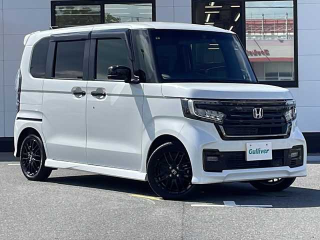 ホンダ Ｎ ＢＯＸ カスタム L ターボ スタイル+ブラック 山口県 2023(令5)年 4.4万km プラチナホワイトパール 純正9インチナビ【LXU-237NBi】/・フルセグテレビ/・CD／DVD/・Bluetooth/・AM/FM/・SD/・MUSIC RACK/・USB/バックカメラ/ETC/前後ドライブレコーダー【DRH-229ND】/両側パワースライドドア/スマートキー/プッシュスタート/電動パーキングブレーキ/USB入力端子×3/シガーソケット/安全装備/・Honda SENSING/　衝突被害軽減ブレーキ/　先行車発進お知らせ機能/　路外逸脱警報機能/　標識認識機能/　ACC/　車線維持支援システム/　誤発進抑制機能/　後方誤発進抑制機能/　近距離衝突被害軽減ブレーキ/・EBD付ABS