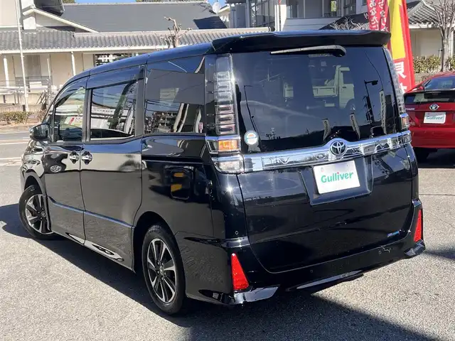 トヨタ ヴォクシー ZS 煌Ⅲ 京都府 2020(令2)年 9.1万km ブラック  ワンオーナー/ トヨタセーフティセンス/ 両側パワースライドドア/ 純正10インチSDFナビ/・　バックカメラ/・　フルセグTV/・　CD/DVD/BTオーディオ/ 前後ドラレコ/ ビルトインETC/ ハーフレザーシート/ HDMI端子/ USB端子/ クルーズコントロール/ ステアリモコン/ 前後ソナー/ 純正16インチアルミ/ 純正フロアマット/ ドアバイザー/ 新車時保証書/ 車両取説
