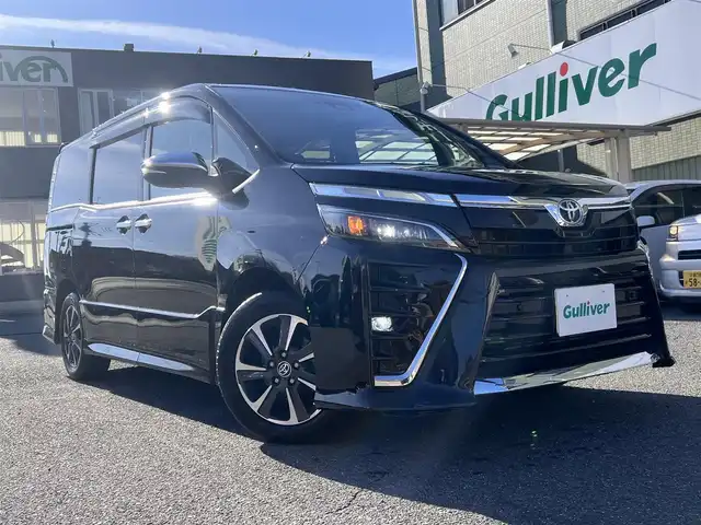 トヨタ ヴォクシー ZS 煌Ⅲ 京都府 2020(令2)年 9.1万km ブラック  ワンオーナー/ トヨタセーフティセンス/ 両側パワースライドドア/ 純正10インチSDFナビ/・　バックカメラ/・　フルセグTV/・　CD/DVD/BTオーディオ/ 前後ドラレコ/ ビルトインETC/ ハーフレザーシート/ HDMI端子/ USB端子/ クルーズコントロール/ ステアリモコン/ 前後ソナー/ 純正16インチアルミ/ 純正フロアマット/ ドアバイザー/ 新車時保証書/ 車両取説
