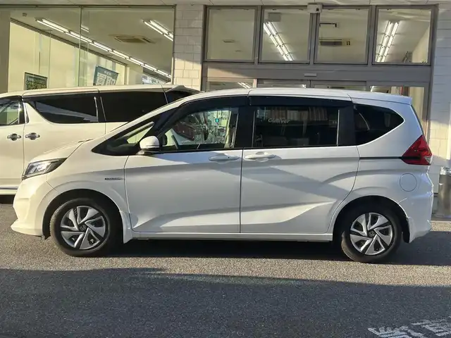 ホンダ フリード ハイブリット G ホンダセンシング 愛知県 2018(平30)年 2.2万km ホワイトオーキッドパール ワンオーナー/純ギャザーズSDナビテレビ/フルセグテレビ/バックカメラ/両側パワースライドドア/ホンダセンシング/ドライブレコーダー/ビルドインETC/プッシュエンジンスタート/LEDヘッドランプ/Cパッケージ/コンフォートパッケージ/新車保証書/取説/スペアキー