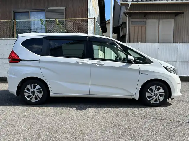 ホンダ フリード ハイブリット G ホンダセンシング 愛知県 2018(平30)年 2.2万km ホワイトオーキッドパール ワンオーナー/純ギャザーズSDナビテレビ/フルセグテレビ/バックカメラ/両側パワースライドドア/ホンダセンシング/ドライブレコーダー/ビルドインETC/プッシュエンジンスタート/LEDヘッドランプ/Cパッケージ/コンフォートパッケージ/新車保証書/取説/スペアキー