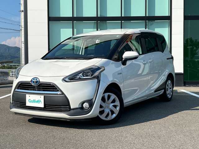 トヨタ シエンタ ハイブリッド G 和歌山県 2017(平29)年 2.6万km ホワイトパールクリスタルシャイン 純正7インチナビ/バックカメラ/衝突軽減/車線逸脱防止/先行車発進お知らせ/両側パワースライドドア/LEDヘッドライト/ETC/ドラレコ/オートライト/オートハイビーム/ステアリングスイッチ/電動格納ミラー/フルオートエアコン/純正フロアマット/ドアバイザー/プッシュスタート/スマートキー