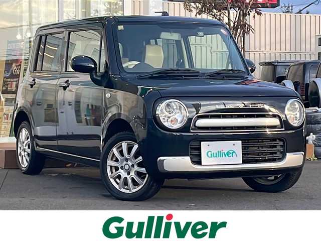 スズキ ラパン ショコラ G 道央・札幌 2014(平26)年 6.6万km ブルーイッシュブラックパール3 ・4WD/・純正ナビ（BT&ワンセグ）/・社外ドライブレコーダー/・電動格納ミラー/・プッシュスタート/・インテリキー/・HIDヘッドライト/・オートライト/・D側シートヒーター/・純正フロアマット/・純正スチールホイール付きサマータイヤ