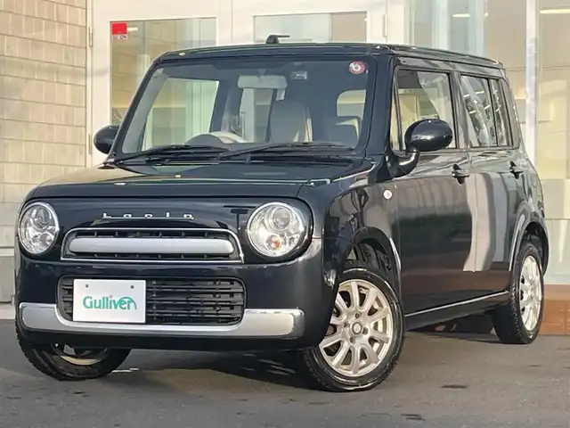 スズキ ラパン ショコラ G 道央・札幌 2014(平26)年 6.6万km ブルーイッシュブラックパール3 ・4WD/・純正ナビ（BT&ワンセグ）/・社外ドライブレコーダー/・電動格納ミラー/・プッシュスタート/・インテリキー/・HIDヘッドライト/・オートライト/・D側シートヒーター/・純正フロアマット/・純正スチールホイール付きサマータイヤ