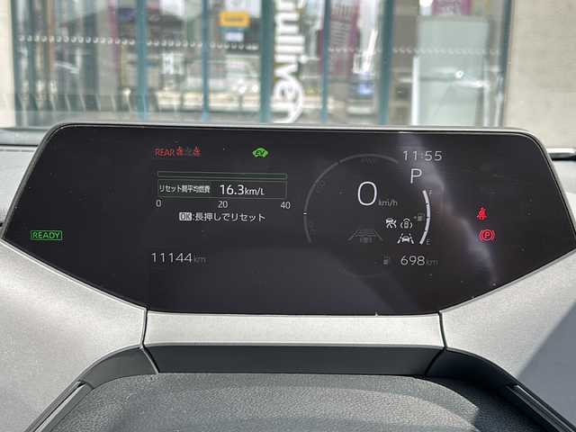 トヨタ プリウス Z 愛知県 2023(令5)年 1.2万km プラチナホワイトパールマイカ 登録時走行距離11144km/ワンオーナー/純正12インチHDDナビ/（Bluetooth/フルセグTV/Miracast)/パラノミックビューモニター/インテリジェントクリアナンスソナー/純正ドラレコ前後/純正デジタルインナーミラー/トヨタセーフティー/プリクラッシュセーフティー/アダブティブクルーズコントロール/レーンディパーチャーアラート/レーントーシングアラート/ブラインドスポットモニター/オートマチックハイビーム/リヤクロストラフィックアラート/パワーバックドア/シートヒーター/ベンチレーション/ビルドイン2.0ETC/D席メモリ機能パワーシート/ステアリングヒーター/ＴＶキャンセラー/電子パーキング/ＡＣ１００Ｖアクセサリー/スペヤタイヤ×１/ＵＳＢ端子/革巻きステアリング/ステアリングスイッチ/フォグランプ/ＬＥＤライト/ドアバイザー/スマートキー/保証書