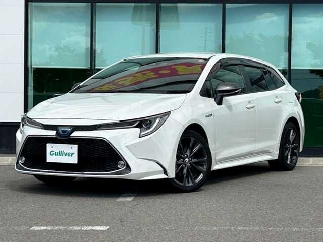 トヨタ カローラツーリング ハイブリッド ダブルバイビー 和歌山県 2020(令2)年 8.7万km ホワイトパールクリスタルシャイン 純正9インチナビ/バックカメラ/フルセグTV/BT/USB/衝突軽減ブレーキ/レーダークルコン/前後コーナーセンサー/ブラインドスポットモニター/オートライト/ビルトインETC/ドラレコ/ハーフレザーシート/LEDヘッドライト/フォグランプ/ドアバイザー