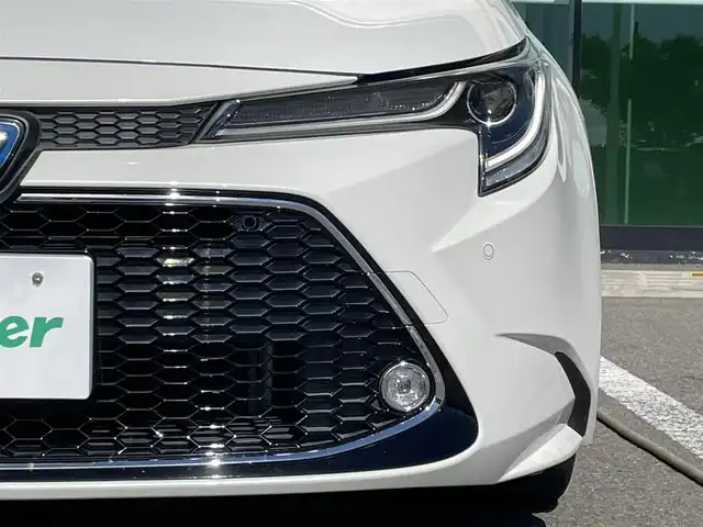 トヨタ カローラツーリング ハイブリッド ダブルバイビー 和歌山県 2020(令2)年 8.7万km ホワイトパールクリスタルシャイン 純正9インチナビ/バックカメラ/フルセグTV/BT/USB/衝突軽減ブレーキ/レーダークルコン/前後コーナーセンサー/ブラインドスポットモニター/オートライト/ビルトインETC/ドラレコ/ハーフレザーシート/LEDヘッドライト/フォグランプ/ドアバイザー