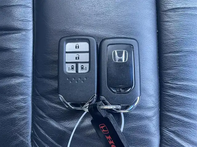 ホンダ オデッセイ アブソルート EX 静岡県 2014(平26)年 7.8万km プレミアムヴィーナスブラックP 純正ナビ/純正フリップダウンモニター/・フルセグTV/・Bluetooth接続/・DVD再生/・USB入力端子/クルーズコントロール/CTBA/BSM/両側パワースライドドア/プッシュスタート/スマートキー/バックカメラ/レザーシート/全席シートヒーター/運転席パワーシート/LEDオートライト/取扱説明書/保証書