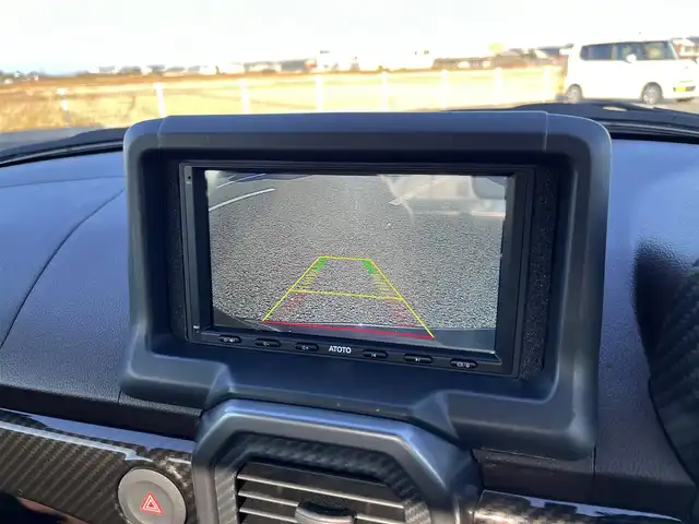 ダイハツ コペン ローブ 鳥取県 2015(平27)年 1.8万km パールホワイトⅢ 5速ミッション・ターボ/ツートンカラー/電動オープン/社外ディスプレイオーディオ/BT/USB/バックカメラ・ETC/前席シートヒーター/LEDヘットライト/フォグライト/ローダウンスプリング/純正16インチアルミホイール/プッシュエンジンスタート/ブースト圧計/フロアマット