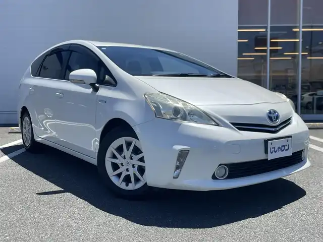 トヨタ プリウス α S 熊本県 2014(平26)年 9.4万km ホワイトパールクリスタルシャイン (株)IDOMが運営する【じしゃロン熊本店】の自社ローン専用車両になりますこちらは現金またはオートローンご利用時の価格です。自社ローンご希望の方は別途その旨お申付け下さい/社外ナビ（ワンセグＴＶ　ＣＤ　ＢＴ）　/バックカメラ　/アイドリングストップ　/ステアリングスイッチ　/ＥＴＣ　/Ｗ＋サイドエアバッグ　/カーテンエアバッグ　/プッシュスタート　/スマートキー　/電動格納ミラー