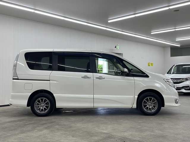 日産 セレナ ハイウェイスター Vセレ +Safty 長崎県 2014(平26)年 7万km ブリリアントホワイトパール カロッツェリア８インチナビ（ＡＶＩＣ－ＣＬ９１０）/（フルセグテレビ/CD/ＤＶＤ/Bluetooth）/バックカメラ/クルーズコントロール/両側パワースライドドア/衝突軽減ブレーキ/横滑り防止装置/ETC/ドライブレコーダー/社外15インチアルミホイール/純正フロアマット/レーンディパーチャーアラート/シートバックテーブル/リアサンシェード/フォグライト/黒革ハンドル/電動ウィンカーミラー/電動格納ミラー/ドアバイザー/プッシュスタート