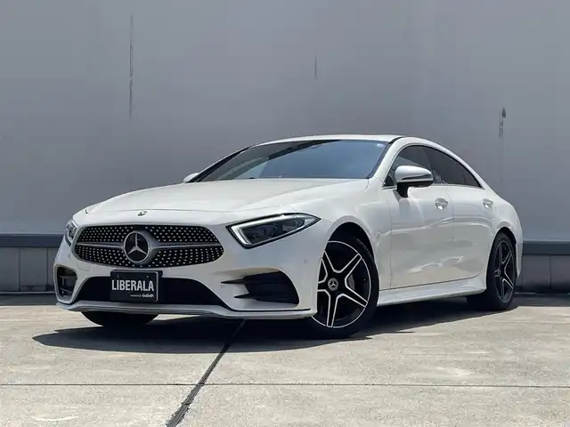 メルセデス・ベンツ ＣＬＳ４５０ 4マチック スポーツ 東京都 2018(平30)年 4.1万km ダイヤモンドホワイト エクスクルーシブパッケージ/サンルーフ/Burmesterサウンド/360°カメラ/ヘッドアップディスプレイ/アダプティブクルーズコントロール/純正ナビ/Bluetooth/フルセグTV/Apple Car Play/ESP/アクティブブレーキアシスト/レーンキープアシスト/パークアシスト/エアサス/D/N席パワーシート（メモリ機能付）/全席シートヒーター/D/N席シートベンチレーション/パワーバックドア/パドルシフト/パヒュームアトマイザー/ETC2.0/ブラックレザーシート