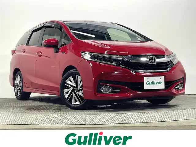ホンダ シャトル ハイブリッド X スタイルエディション 大阪府 2016(平28)年 4.8万km ミラノレッド あんしんＰＧ　クルコン　衝突軽減　ハーフレザー　ＥＴＣ　ドラレコ　純正ナビフルセグＴＶ（Ｂｌｕｅｔｏｏｔｈ接続，ＣＤ，ＤＶＤ再生）　アイドリングストップ　スマートキー　オートライト　ＬＥＤヘッドライト