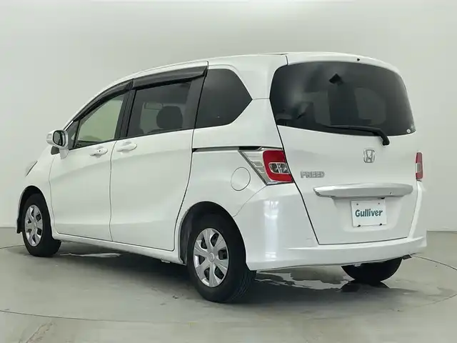 ホンダ フリード G プレミアムエディション 富山県 2016(平28)年 3.1万km ホワイトオーキッドパール 純正ナビ（AM/FM/CD/DVD/BT）/フルセグTV/バックカメラ/フリップダウンモニター/両側パワースライドドア/ハーフレザーシート/クルーズコントロール/スマートキー×2/HIDヘッドライト/横滑り防止装置/純正フロアマット