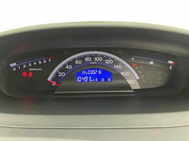 ホンダ フリード G プレミアムエディション 富山県 2016(平28)年 3.1万km ホワイトオーキッドパール 純正ナビ（AM/FM/CD/DVD/BT）/フルセグTV/バックカメラ/フリップダウンモニター/両側パワースライドドア/ハーフレザーシート/クルーズコントロール/スマートキー×2/HIDヘッドライト/横滑り防止装置/純正フロアマット