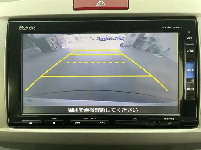 ホンダ フリード G プレミアムエディション 富山県 2016(平28)年 3.1万km ホワイトオーキッドパール 純正ナビ（AM/FM/CD/DVD/BT）/フルセグTV/バックカメラ/フリップダウンモニター/両側パワースライドドア/ハーフレザーシート/クルーズコントロール/スマートキー×2/HIDヘッドライト/横滑り防止装置/純正フロアマット