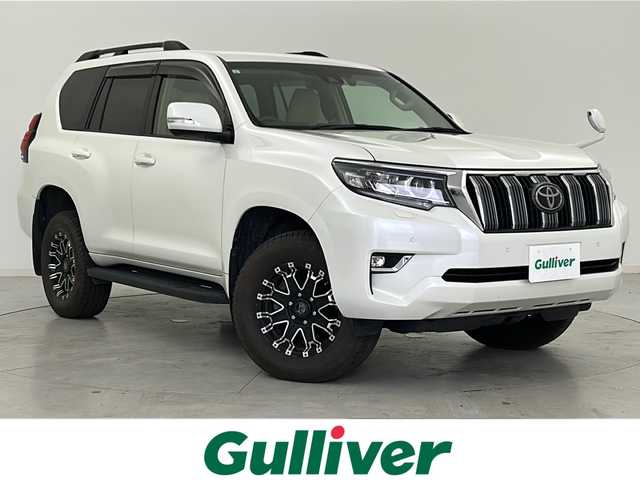 トヨタ ランドクルーザー プラド TX 宮城県 2019(令1)年 5.9万km ホワイトパールクリスタルシャイン Toyota Safety Sense /・プリクラッシュセーフティ/・レーンディパーチャーアラート/・オートマチックハイビーム/・レーダークルーズコントロール/純正7インチSDナビ/・BT.HDMI.SD.USB/バックカメラ/フルセグTV/ステアリングスイッチ/プッシュスタート/スマートキー×2/純正エンジンスターター/ビルトインETC2.0/純正ドライブレコーダー（F）/LEDヘッドライト/LEDフォグライト/純正フロアマット/社外16インチAW/ワイパーデアイサー/ダウンヒルアシスト/レザー調シートカバー/ドアバイザー