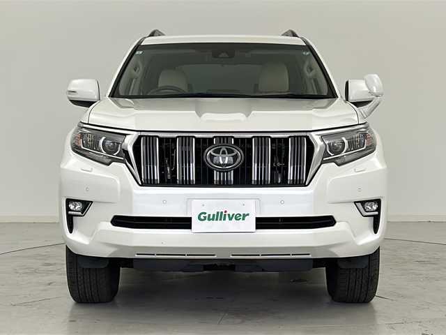 トヨタ ランドクルーザー プラド TX 宮城県 2019(令1)年 5.9万km ホワイトパールクリスタルシャイン Toyota Safety Sense /・プリクラッシュセーフティ/・レーンディパーチャーアラート/・オートマチックハイビーム/・レーダークルーズコントロール/純正7インチSDナビ/・BT.HDMI.SD.USB/バックカメラ/フルセグTV/ステアリングスイッチ/プッシュスタート/スマートキー×2/純正エンジンスターター/ビルトインETC2.0/純正ドライブレコーダー（F）/LEDヘッドライト/LEDフォグライト/純正フロアマット/社外16インチAW/ワイパーデアイサー/ダウンヒルアシスト/レザー調シートカバー/ドアバイザー