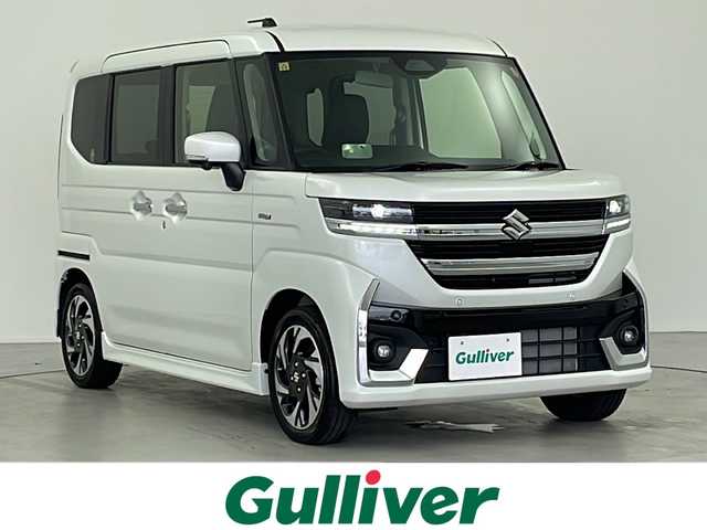 スズキ スペーシア カスタム HYBRID XS 岐阜県 2023(令5)年 0.1千km ピュアホワイトP 純正9インチメモリーナビゲーション/全方位カメラ/フルセグテレビ/Bluetooth /AM FM/USB/iPod/HDMI/Apple CarPlay/Android Auto/GPSアンテナ/TV用ガラスアンテナ/ハンズフリーマイク/メモリーナビゲーション専用オーディオガーニッシュ/SOSボタン/スズキコネクト対応通信機装着車/革巻きステアリング/ステアリングヒーター/ステアリングリモコン/レーダークルーズコントロール/ヘッドアップディスプレイ/LEDヘッドライト/オートライト/ヘッドライトレベライザー/両側パワースライドドア/ハーフレザーシート/シートヒーター(D/N席)/デュアルブレーキサポートII/横滑り防止装置/ふらつき警報/車線逸脱抑制/低車速支援機能/速度超過注意喚起機能/標識認識機能/先行者発信お知らせ機能/信号切り替わりお知らせ機能/電動パーキングブレーキ/オートホールド機能