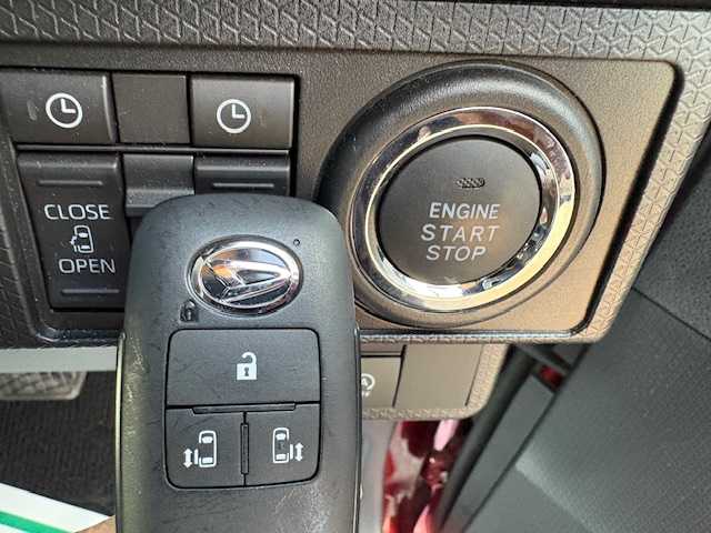 ダイハツ タント カスタム X 大阪府 2023(令5)年 1.4万km ブラックマイカメタリック/ファイアークォーツレッドメタリック 2トーン 純正ナビ/バックカメラ/フルセグ/両側パワースライドドア/スマートアシスト/シートヒーター/ハーフレザーシート/純正アルミホイール/LEDヘッドライト/プッシュスタート/スマートキー