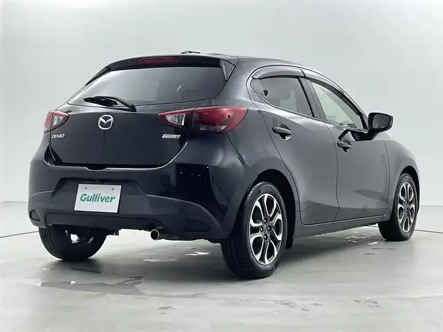 マツダ デミオ XD ツーリング 福井県 2015(平27)年 5.5万km ジェットブラックマイカ ディーゼル/純正マツダコネクトナビ/CD/DVD/フルセグTV/Bluetooth/USB/AM/FM/バックカメラ/衝突軽減ブレーキ/ETC/革巻きステアリング/ステアリングリモコン/ステアリングチルド機構/オートライト/フォグランプ/電動格納式ミラー/リアワイパー/社外シートカバー