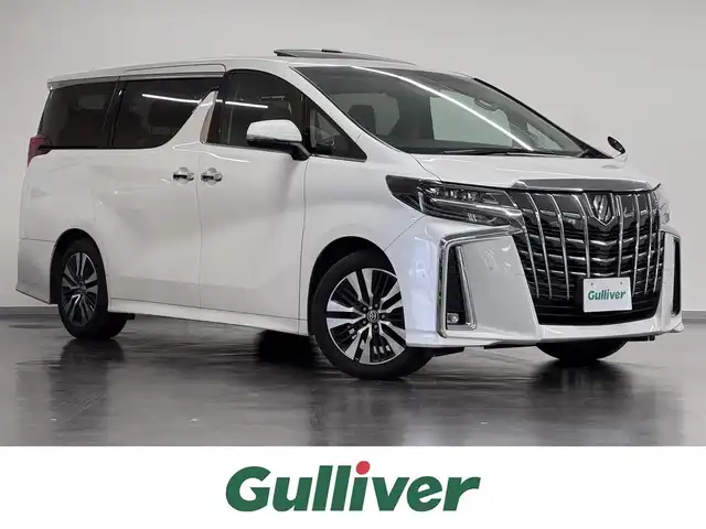 トヨタ アルファード S Cパッケージ 三重県 2021(令3)年 7.8万km ホワイトパールクリスタルシャイン ガソリン/FF/MTモード付インパネCVT/純正 9インチディスプレイオーディオ/（FM/AM/USB/iPod/Bluetooth/TV/Miracast/CarPlay/AndroidAuto）/バックガイドモニター/両側パワースライドドア/ドライブレコーダー 前後/ETC/Toyota Safety Sense/・プリクラッシュセーフティ/・レーントレーシングアシスト/・クリアランスソナー/・パーキングサポートブレーキ/・アダプティブハイビームシステム/・レーダークルコン/・ロードサインアシスト/・先行車発進告知機能/・ブラインドスポットモニター*＋リヤクロストラフィックアラート*/など/装備/・ツインムーンルーフ*/・デジタルインナーミラー*/・合皮シート/・パワーシート（D/N）/・エグゼクティブパワーシート（電動リクライニング＆オットマン（N/2nd））/・パワーバックドア/・シートヒーター・ベンチレーション（D/N）/・ステアリングヒーター/・オートライト/・3眼LEDヘッドランプ/・左右・後席独立オートエアコン/・純正18AW/・スマートキーx1/など
