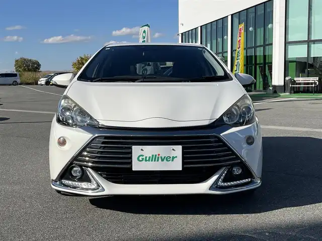 トヨタ アクア G G’s 奈良県 2015(平27)年 4.3万km ライムホワイトパールクリスタルシャイン 純正7インチナビ（NSCP-W62）/クルーズコントロール/バックカメラ/横滑り防止/ハーフレザーシート/前席シートヒーター/オートライト/LEDヘッドライト/電動格納ミラー/後方ドライブレコーダー/ETC/純正17インチAW/保証書/取り扱い説明書/スペアキーX1