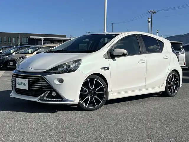 トヨタ アクア G G’s 奈良県 2015(平27)年 4.3万km ライムホワイトパールクリスタルシャイン 純正7インチナビ（NSCP-W62）/クルーズコントロール/バックカメラ/横滑り防止/ハーフレザーシート/前席シートヒーター/オートライト/LEDヘッドライト/電動格納ミラー/後方ドライブレコーダー/ETC/純正17インチAW/保証書/取り扱い説明書/スペアキーX1