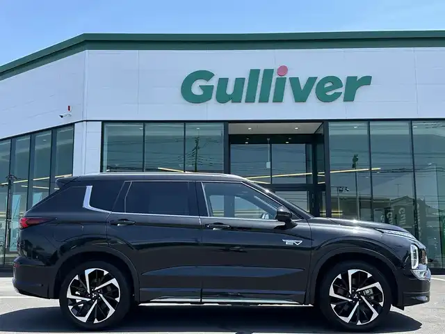 三菱 アウトランダー ＰＨＥＶ P 栃木県 2022(令4)年 4.1万km ブラックダイヤモンド 電動パノラマサンルーフ/スポーティーパッケージ/純正9インチナビ/BOSEサウンド/AppleCarPlay/AndroidAuto/Bluetoothオーディオ/フルセグTV（走行中視聴可）/ステアリングリモコン/マルチアラウンドモニター/ワイヤレス充電/三菱e-Assist/マイパイロット/レーンアシスト/ブラインドスポットモニター/ヘッドアップディスプレイ/エレクトリックテールゲート/アダプティブLEDヘッドライト/マッサージ機能付パワーシート/全席シートヒーター/ステアリングヒーター/ビルトインETC2.0/AC1500W給電
