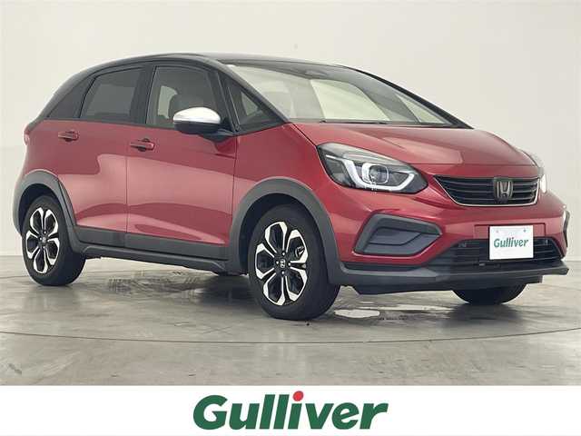 ホンダ フィット e:HEVクロスター 滋賀県 2020(令2)年 5.4万km プレミアムクリスタルレッドM 純正9インチナビ/（CD/DVD/フルセグTV/Bluetooth）/バックカメラ/追従型クルーズコントロール/ビルトインETC/ドライブレコーダー/オートライト/オートハイビーム/コーナーセンサー/LEDヘッドライト/衝突回避支援システム/レーンキープアシスト/横滑り防止装置/電動パーキングブレーキ/プッシュスタート/スマートキー