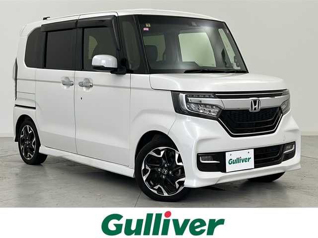 ホンダ Ｎ ＢＯＸ カスタム G L ターボ ホンダセンシング 宮城県 2018(平30)年 6.1万km プラチナホワイトパール ホンダセンシング/・衝突軽減ブレーキ/・アダプティブクルーズコントロール/・レーンキープアシスト/・先行車発進お知らせ/・標識認識機能/両側パワースライドドア/社外7インチナビ/・BT.CD.DVD.AM.FM/バックカメラ/ワンセグテレビ/ビルトインETC/革巻きステアリング/パドルシフト/ステアリングスイッチ/プッシュスタート/スマートキー（2本）/ハーフレザーシート/純正フロアマット/純正15インチアルミホイール/LEDヘッドライト/LEDフォグランプ/ドアバイザー/ウインカーミラー/アイドリングストップ/横滑り防止機能