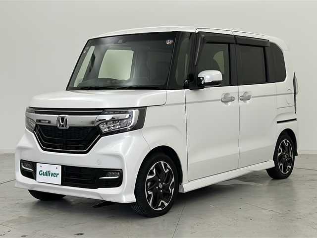 ホンダ Ｎ ＢＯＸ カスタム G L ターボ ホンダセンシング 宮城県 2018(平30)年 6.1万km プラチナホワイトパール ホンダセンシング/・衝突軽減ブレーキ/・アダプティブクルーズコントロール/・レーンキープアシスト/・先行車発進お知らせ/・標識認識機能/両側パワースライドドア/社外7インチナビ/・BT.CD.DVD.AM.FM/バックカメラ/ワンセグテレビ/ビルトインETC/革巻きステアリング/パドルシフト/ステアリングスイッチ/プッシュスタート/スマートキー（2本）/ハーフレザーシート/純正フロアマット/純正15インチアルミホイール/LEDヘッドライト/LEDフォグランプ/ドアバイザー/ウインカーミラー/アイドリングストップ/横滑り防止機能
