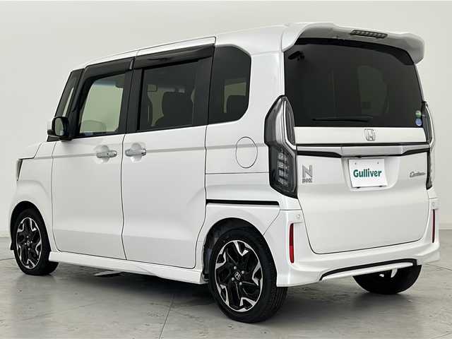 ホンダ Ｎ ＢＯＸ カスタム G L ターボ ホンダセンシング 宮城県 2018(平30)年 6.1万km プラチナホワイトパール ホンダセンシング/・衝突軽減ブレーキ/・アダプティブクルーズコントロール/・レーンキープアシスト/・先行車発進お知らせ/・標識認識機能/両側パワースライドドア/社外7インチナビ/・BT.CD.DVD.AM.FM/バックカメラ/ワンセグテレビ/ビルトインETC/革巻きステアリング/パドルシフト/ステアリングスイッチ/プッシュスタート/スマートキー（2本）/ハーフレザーシート/純正フロアマット/純正15インチアルミホイール/LEDヘッドライト/LEDフォグランプ/ドアバイザー/ウインカーミラー/アイドリングストップ/横滑り防止機能