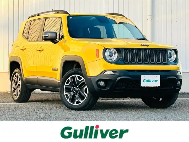 クライスラー・ジープ ジープ レネゲード トレイルホーク 熊本県 2017(平29)年 3.1万km 黄 純正ディスプレイオーディオ/・AM/FM/USB/AUX/BT/バックカメラ/レーンキープアシスト/クリアランスソナー/横滑り防止機能/ブラインドスポットモニター/ダウンヒルアシストコントロール/クルーズコントロール/後方コーナーセンサー/革巻きステアリング/・ステアリングリモコン/電動格納ミラー/・ウィンカーミラー/オートライト/・フォグランプ/・HIDライト/電動サイドブレーキ/前後ドライブレコーダー（DRY-TW7550）/トノカバー/ルーフレール/純正フロアマット/純正アルミホイール/スマートキー