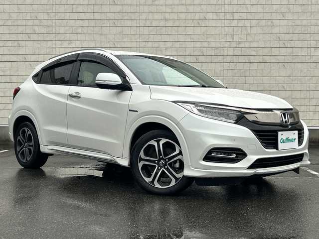 ホンダ ヴェゼル ハイブリッド Z ホンダセンシング 大阪府 2018(平30)年 3.5万km プラチナホワイトパール 純正ナビ(BT/フルセグ/DVD/USB)/バックカメラ/レーダークルーズコントロール/衝突被害軽減システム/レーンキープアシスト/盗難防止装置/横滑り防止装置/コーナーセンサー/ハーフレザーシート/シートヒーター/ドライブレコーダー/ETC/LEDヘッドライト/オートライト/純正フロアマット/純正アルミホイール/スペアキー