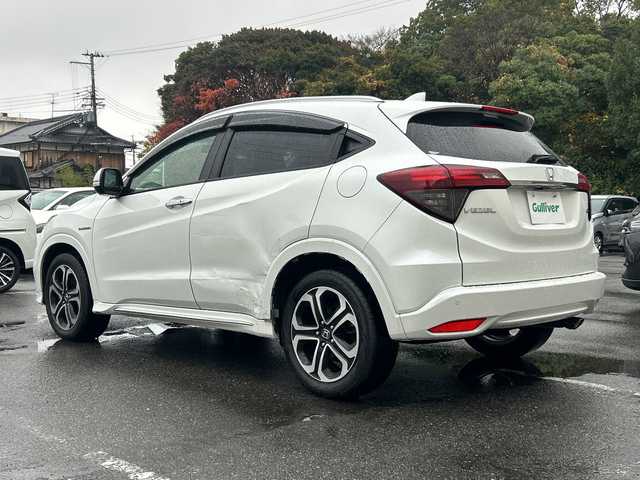 ホンダ ヴェゼル ハイブリッド Z ホンダセンシング 大阪府 2018(平30)年 3.5万km プラチナホワイトパール 純正ナビ(BT/フルセグ/DVD/USB)/バックカメラ/レーダークルーズコントロール/衝突被害軽減システム/レーンキープアシスト/盗難防止装置/横滑り防止装置/コーナーセンサー/ハーフレザーシート/シートヒーター/ドライブレコーダー/ETC/LEDヘッドライト/オートライト/純正フロアマット/純正アルミホイール/スペアキー