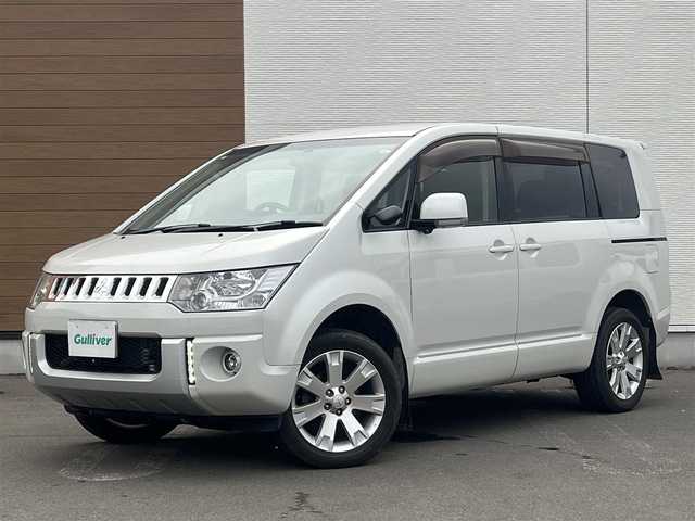 三菱 デリカＤ：５ D－Power package 秋田県 2015(平27)年 11.5万km ウォームホワイトパール ４WD/ディーゼルターボ/純正ナビ/フルセグ/バックカメラ/両側パワスラ/純正アルミ/スマートキー/クルーズコントロール/前席シートヒーター/フリップダウンモニター/電動リアゲート/ステアリングスイッチ/パドルシフト/社外フロアマット/純正ドアバイザー/ETC/オートライト/オートエアコン/パワーステアリング/パワーウィンドウ/横滑り防止/電動格納ウィンカーミラー/保証書/取扱説明書/記録簿