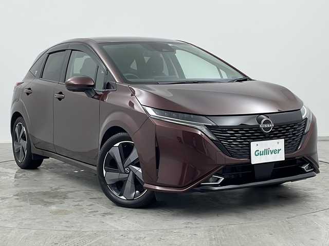 日産 オーラ G 三重県 2022(令4)年 0.9万km バーガンディー 禁煙車/純正9インチナビ/全方位カメラ/フルセグ/デジタルインナーミラー/ETC/前後ドライブレコーダー/衝突軽減ブレーキ/車線逸脱システム/ブラインドスポットモニター/オートハイビーム/コーナーセンサー/純正17インチAW/スマートキー