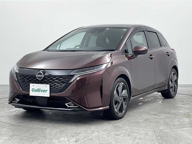 日産 オーラ G 三重県 2022(令4)年 0.9万km バーガンディー 禁煙車/純正9インチナビ/全方位カメラ/フルセグ/デジタルインナーミラー/ETC/前後ドライブレコーダー/衝突軽減ブレーキ/車線逸脱システム/ブラインドスポットモニター/オートハイビーム/コーナーセンサー/純正17インチAW/スマートキー