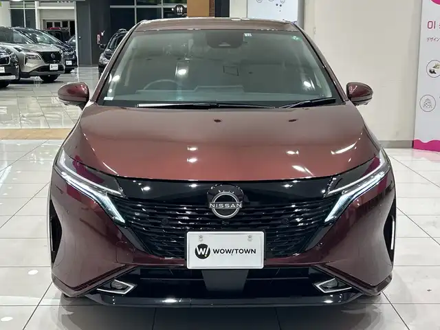 日産 オーラ G 埼玉県 2022(令4)年 0.9万km バーガンディー エマージェンシーブレーキ/純正ナビ/　　BT/HDMI/フルセグTV/アラウンドビューモニター/LEDオートライト/ハーフレザー/純正17インチAW/デジタルインナーミラー/ステアリングスイッチ/ドライブレコーダー/プッシュスタート/禁煙車