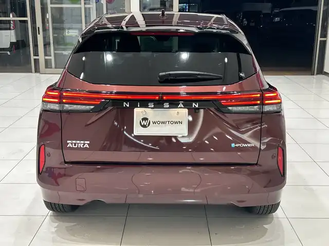 日産 オーラ G 埼玉県 2022(令4)年 0.9万km バーガンディー エマージェンシーブレーキ/純正ナビ/　　BT/HDMI/フルセグTV/アラウンドビューモニター/LEDオートライト/ハーフレザー/純正17インチAW/デジタルインナーミラー/ステアリングスイッチ/ドライブレコーダー/プッシュスタート/禁煙車