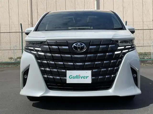 トヨタ アルファードハイブリット Z 東京都 2024(令6)年 1万km プラチナホワイトパールマイカ トヨタセーフティセンス/左右独立ムーンルーフ/純正コネクトナビ/パノラミックビューモニター/シートベンチレーション/両側電動スライドドア/パワーシート/電動リアゲート/ワイヤレス充電