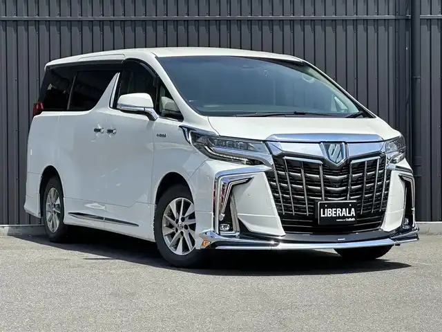 トヨタ アルファードハイブリット SR サイドリフトアップ 福島県 2018(平30)年 3.3万km ホワイトパールクリスタルシャイン サイドリフトアップチルトシート装着車/モデリスタエアロ/純正ナビ/(CD/DVD/BT/SD/AUX/USB/HDMI)/フルセグ/バックカメラ/フリップダウンモニター/アダプティブクルーズコントロール/デジタルインナーミラー/黒レザーシート/シートヒーター/ベンチレーション/パワーシート/エンジンスターター/ETC2.0/両側パワースライドドア/ブレーキホールド/純正16AW/純正フロアマット/取扱説明書/保証書/スペアキー