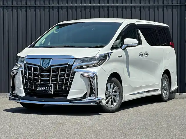 トヨタ アルファードハイブリット SR サイドリフトアップ 福島県 2018(平30)年 3.3万km ホワイトパールクリスタルシャイン サイドリフトアップチルトシート装着車/モデリスタエアロ/純正ナビ/(CD/DVD/BT/SD/AUX/USB/HDMI)/フルセグ/バックカメラ/フリップダウンモニター/アダプティブクルーズコントロール/デジタルインナーミラー/黒レザーシート/シートヒーター/ベンチレーション/パワーシート/エンジンスターター/ETC2.0/両側パワースライドドア/ブレーキホールド/純正16AW/純正フロアマット/取扱説明書/保証書/スペアキー