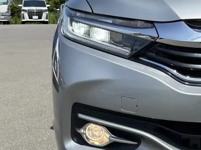 ホンダ シャトル ハイブリッド Z 青森県 2015(平27)年 6.1万km ティンテッドシルバーM ・４WD/・社外SDナビ/（AM/FM/CD/DVD/フルセグ）/・Bluetooth/・クルーズコントロール/・車両接近通報装置/・バックカメラ/・横滑り防止装置/・盗難防止装置/・プッシュスタート/・スマートキー/・スペアキー/・エンジンスターター/・オートライト/・LEDライト/・フォグランプ/・電動格納ミラー/・ドアバイザー/・マニュアルモード付AT/・パドルシフト/・前席シートヒーター/・ミラーヒーター/・ETC/・前後ドライブレコーダー/・純正16インチアルミホイール/・社外アルミホイール付冬タイヤあり/・社外フロアマット