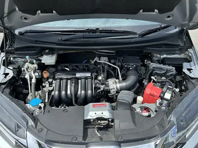 ホンダ シャトル ハイブリッド Z 青森県 2015(平27)年 6.1万km ティンテッドシルバーM ・４WD/・社外SDナビ/（AM/FM/CD/DVD/フルセグ）/・Bluetooth/・クルーズコントロール/・車両接近通報装置/・バックカメラ/・横滑り防止装置/・盗難防止装置/・プッシュスタート/・スマートキー/・スペアキー/・エンジンスターター/・オートライト/・LEDライト/・フォグランプ/・電動格納ミラー/・ドアバイザー/・マニュアルモード付AT/・パドルシフト/・前席シートヒーター/・ミラーヒーター/・ETC/・前後ドライブレコーダー/・純正16インチアルミホイール/・社外アルミホイール付冬タイヤあり/・社外フロアマット