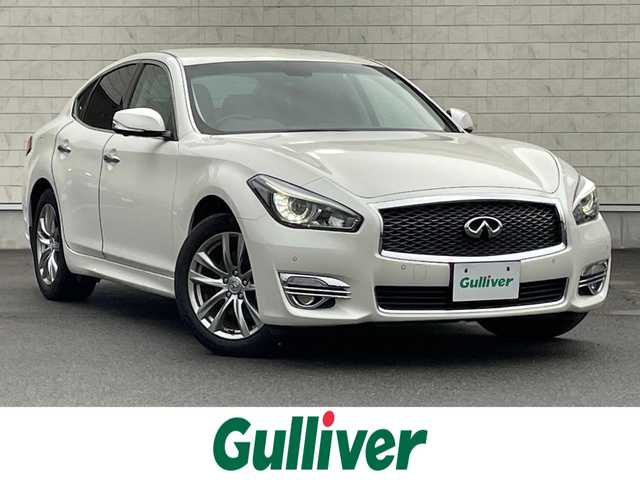 日産 フーガ 250GT Aパッケージ 群馬県 2018(平30)年 7.7万km ブリリアントホワイトパール 安全装備/・衝突軽減ブレーキ/・横滑り防止/・アラウンドビューモニター/・クルーズコントロール/・コーナーセンサー/・オートライト/純正ナビ/・AM/FM/Bluetooth/・CD/DVD/USB/・フルセグTV/MSV/LEDヘッドライト/LEDフォグランプ/パワーシート/ドライブレコーダー/ETC/純正フロアマット/スマートキー/プッシュスタート/左手ブレーキ、アクセルレバー付き
