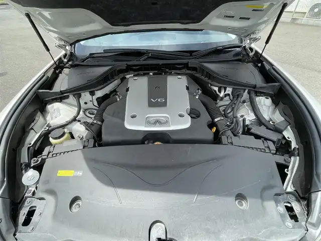 日産 フーガ 250GT Aパッケージ 群馬県 2018(平30)年 7.7万km ブリリアントホワイトパール 安全装備/・衝突軽減ブレーキ/・横滑り防止/・アラウンドビューモニター/・クルーズコントロール/・コーナーセンサー/・オートライト/純正ナビ/・AM/FM/Bluetooth/・CD/DVD/USB/・フルセグTV/MSV/LEDヘッドライト/LEDフォグランプ/パワーシート/ドライブレコーダー/ETC/純正フロアマット/スマートキー/プッシュスタート/左手ブレーキ、アクセルレバー付き