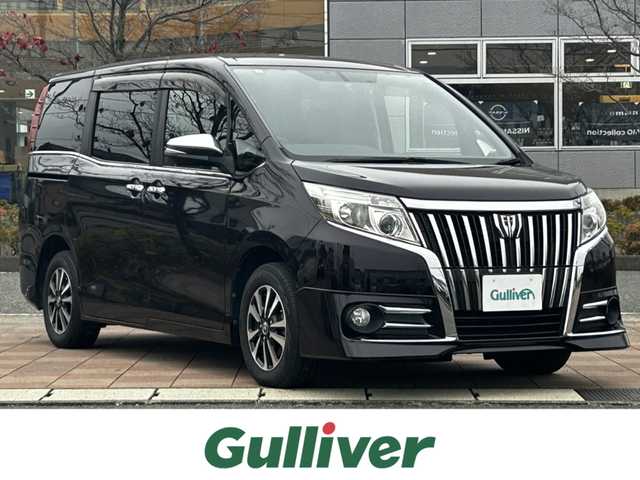 トヨタ エスクァイア Gi 福島県 2015(平27)年 6.9万km ボルドーマイカメタリック 純正ナビ（NSZT-Y64T）/（AM/FM/BT/CD/DVD/TV）/バックカメラ/クルーズコントロール/前席シートヒーター/両側パワースライドドア/ETC/ドライブレコーダー前後/LEDオートヘッドライト/純正15インチアルミ/スマートキー/プッシュスタート